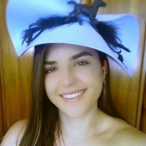 Light blue woven Kentucky Derby hat with black horse and feathers